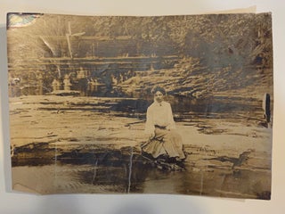 Item #3446 [DREAMY SILVER PRINT PHOTOGRAPH ca. 1910]. Woman seated on a river bank. Silver print...