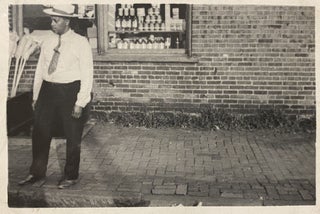 [AFRICAN-AMERICANA - VERNACULAR PHOTOGRAPHS]. Small collection of 7 original photographs of African-Americans (six were taken in the street, the other on a hard-scrabble beach)