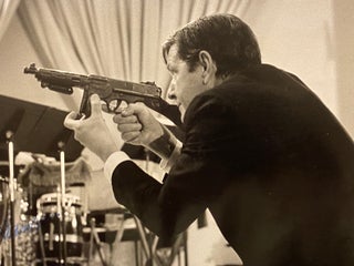 [JOHN CAGE]. Signed photograph of John Cage with Toy Machine Gun