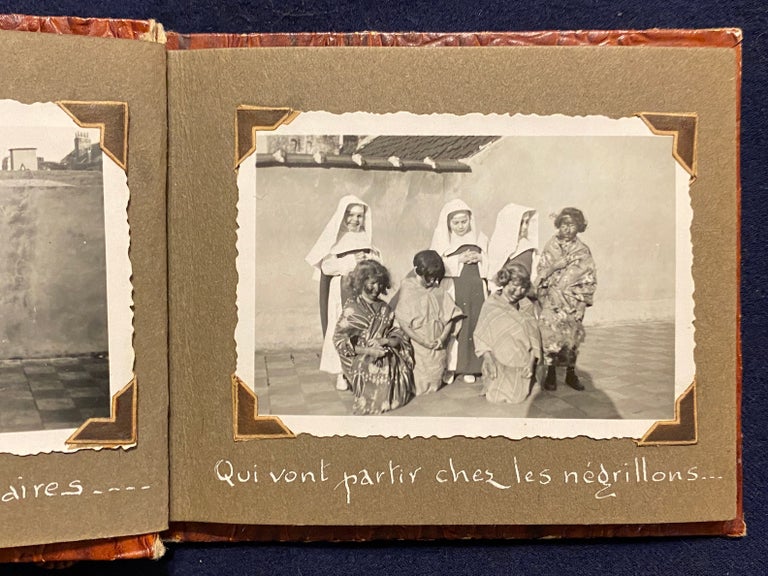 Item #4003 [AFRICAN COLONIALISM FOR CHILDREN]. Photo Album of Belgian Children (novitiates?) posed as missionary nuns, some of whom are in blackface. Vernacular photo album.