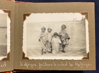 [AFRICAN COLONIALISM FOR CHILDREN]. Photo Album of Belgian Children (novitiates?) posed as missionary nuns, some of whom are in blackface