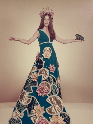 [SAN ANTONIO, TEXAS COSTUME AND HIGH SOCIETY]. Collection of 21 original color photographs of the Fiesta Parade "Queens and Princesses" in spectacular gowns and trains. TOGETHER WITH: The Order of the Alamo Presents The Court of Gardens (program)
