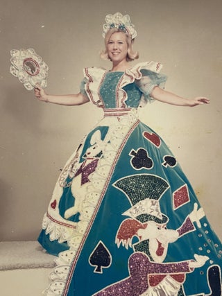 [SAN ANTONIO, TEXAS COSTUME AND HIGH SOCIETY]. Collection of 21 original color photographs of the Fiesta Parade "Queens and Princesses" in spectacular gowns and trains. TOGETHER WITH: The Order of the Alamo Presents The Court of Gardens (program)