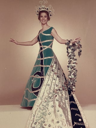 [SAN ANTONIO, TEXAS COSTUME AND HIGH SOCIETY]. Collection of 21 original color photographs of the Fiesta Parade "Queens and Princesses" in spectacular gowns and trains. TOGETHER WITH: The Order of the Alamo Presents The Court of Gardens (program)